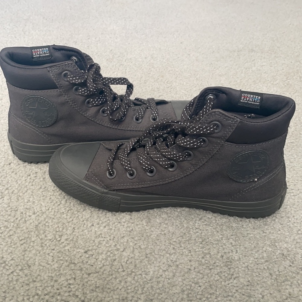 Converse all black high tops